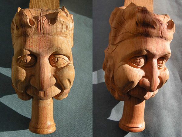 Carved green man for a bagpipe maker