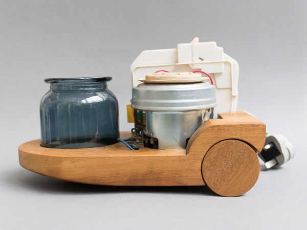 Contemporary craft - Vacuum Cleaner base carved in recycled teak