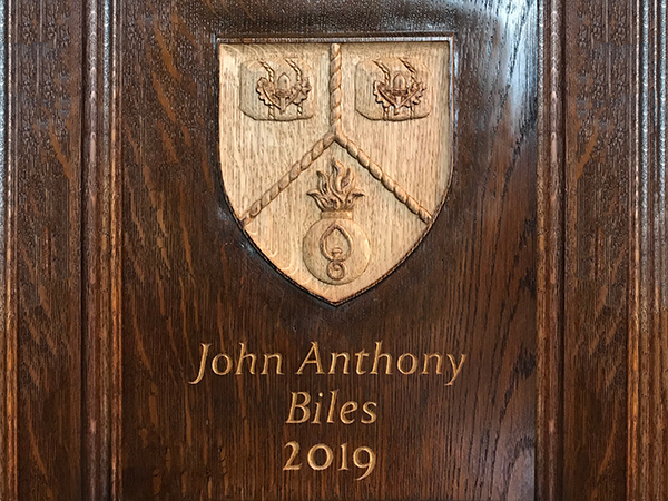2019 Master's Coat of Arms - Carved in situ on oak panelling
