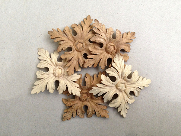 Decorative ornaments - Carved wooden rosettes